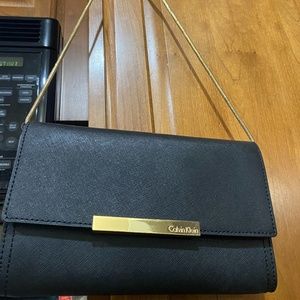 Calvin Klein navy purse with gold chain